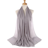 Gray scarf on a mannequin with a white background