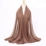 Brown scarf on a mannequin with a white background