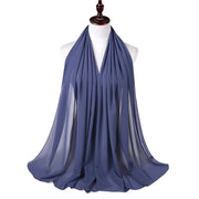 Blue scarf on a mannequin with a white background
