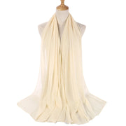 Beige scarf on a mannequin with a white background